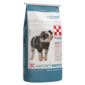 Purina Nature's Match Starter-Grower. Blue and white 50-lb feedbag. Feed for swine.